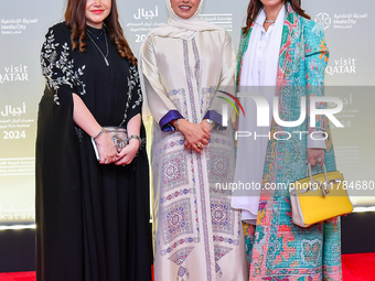 Fatma Al Remaihi, CEO of the Doha Film Institute, and Salam Shawa attend the 'Sudan, Remember Us' red carpet during the screening on the ope...