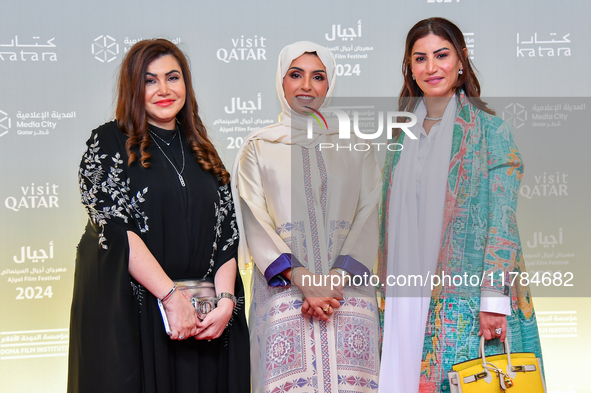 Fatma Al Remaihi, CEO of the Doha Film Institute, and Salam Shawa attend the 'Sudan, Remember Us' red carpet during the screening on the ope...