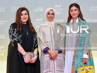 Fatma Al Remaihi, CEO of the Doha Film Institute, and Salam Shawa attend the 'Sudan, Remember Us' red carpet during the screening on the ope...