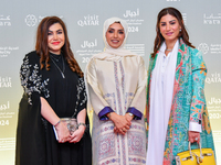 Fatma Al Remaihi, CEO of the Doha Film Institute, and Salam Shawa attend the 'Sudan, Remember Us' red carpet during the screening on the ope...