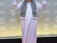 Qatari actor Ali Mirza Mahmoud attends the 'Sudan, Remember Us' red carpet during the screening on the opening night of the Ajyal Film Festi...