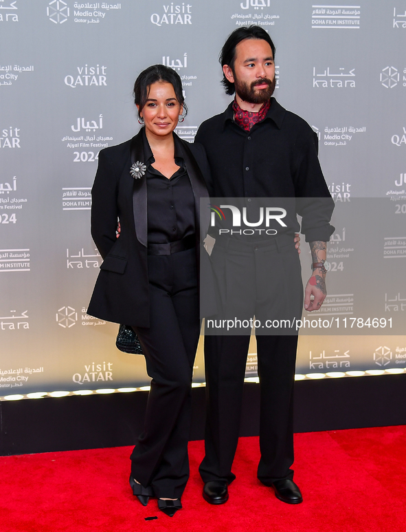 Director Sing J. Lee (R) attends the 'Sudan, Remember Us' red carpet during the screening on the opening night of the Ajyal Film Festival 20...