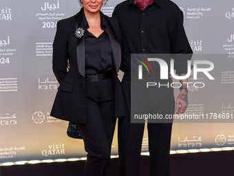 Director Sing J. Lee (R) attends the 'Sudan, Remember Us' red carpet during the screening on the opening night of the Ajyal Film Festival 20...