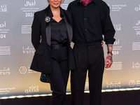 Director Sing J. Lee (R) attends the 'Sudan, Remember Us' red carpet during the screening on the opening night of the Ajyal Film Festival 20...