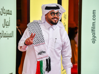 Qatari artist Hamad Al-Ammari attends the 'Sudan, Remember Us' red carpet during the screening on the opening night of the Ajyal Film Festiv...