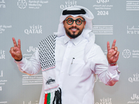 Qatari artist Hamad Al-Ammari attends the 'Sudan, Remember Us' red carpet during the screening on the opening night of the Ajyal Film Festiv...