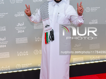 Qatari artist Hamad Al-Ammari attends the 'Sudan, Remember Us' red carpet during the screening on the opening night of the Ajyal Film Festiv...