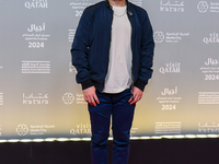 Director Jianjie Lin attends the 'Sudan, Remember Us' red carpet during the screening on the opening night of the Ajyal Film Festival 2024,...