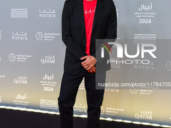 Fatma Al Remaihi, CEO of the Doha Film Institute, and Ahmed Shihab-Eldin attend the 'Sudan, Remember Us' red carpet during the screening on...