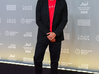 Fatma Al Remaihi, CEO of the Doha Film Institute, and Ahmed Shihab-Eldin attend the 'Sudan, Remember Us' red carpet during the screening on...