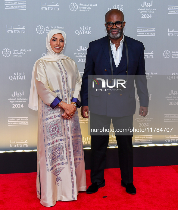 Fatma Al Remaihi, CEO of the Doha Film Institute, and Misan Harriman attend the ''Sudan, Remember Us'' red carpet during the screening on th...