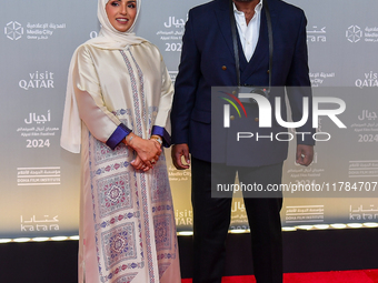 Fatma Al Remaihi, CEO of the Doha Film Institute, and Misan Harriman attend the ''Sudan, Remember Us'' red carpet during the screening on th...