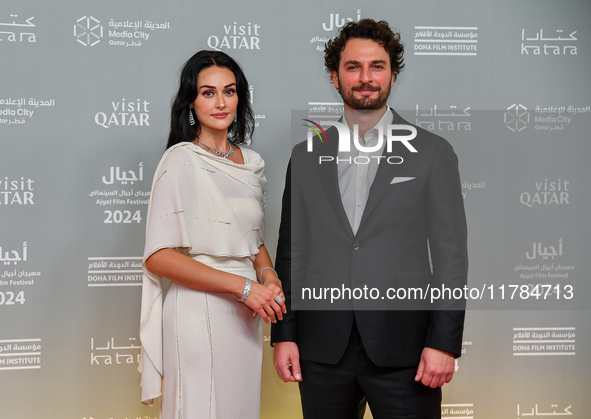 Turkish actress Esra Bilgic (L) attends the 'Sudan, Remember Us' red carpet during the screening on the opening night of the Ajyal Film Fest...