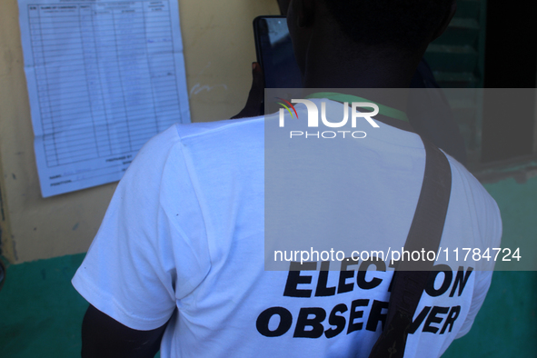 An election observer captures election results at Ward 2, Unity 6 during the 2024 Governorship election for Ondo State in Ugbonla, Ilaje, Lo...