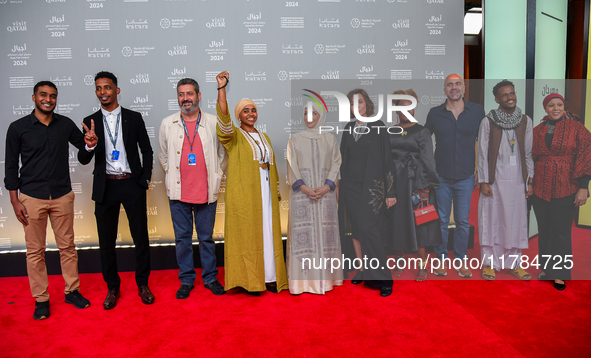 Fatma Al Remaihi, CEO of the Doha Film Institute, Hind Meddeb, Shajane Suliman, and a group of filmmakers from ''Sudan, Remember Us'' attend...