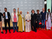 Fatma Al Remaihi, CEO of the Doha Film Institute, Hind Meddeb, Shajane Suliman, and a group of filmmakers from ''Sudan, Remember Us'' attend...