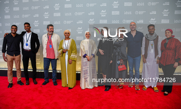 Fatma Al Remaihi, CEO of the Doha Film Institute, Hind Meddeb, Shajane Suliman, and a group of filmmakers from ''Sudan, Remember Us'' attend...