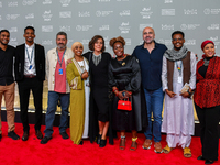 Hind Meddeb (center), Shajane Suliman (fourth from left), and a group of filmmakers from ''Sudan, Remember Us'' attend the ''Sudan, Remember...