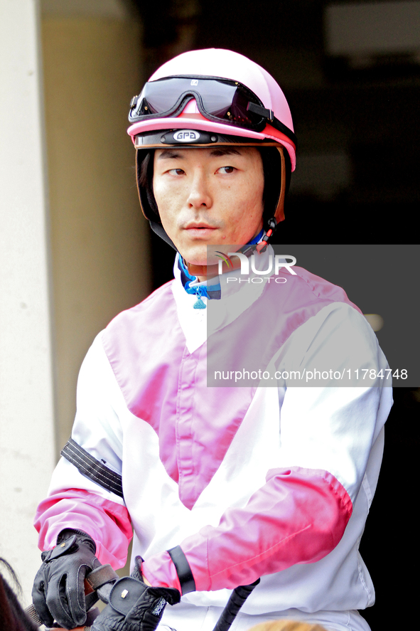 Jockey Daisuke Fukumoto rides out of the paddock ahead of the first race at Woodbine Racetrack in Toronto, Canada, on November 16, 2024. 