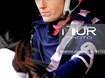 Jockey Amanda Vandermeersch rides Lulu's Lullaby out of the paddock for the second race at Woodbine Racetrack in Toronto, Canada, on Novembe...