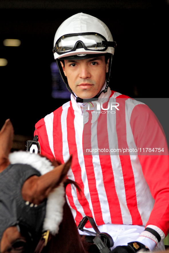 Jockey Eswan Flores rides Kantbackoff out of the paddock for the second race at Woodbine Racetrack in Toronto, Canada, on November 16, 2024....