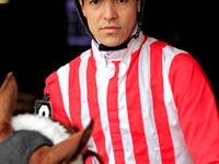 Jockey Eswan Flores rides Kantbackoff out of the paddock for the second race at Woodbine Racetrack in Toronto, Canada, on November 16, 2024....