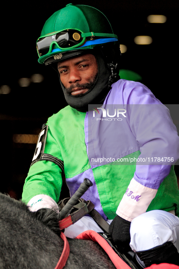 Jockey Juan Crawford rides out of the paddock for the second race at Woodbine Racetrack in Toronto, Canada, on November 16, 2024. 