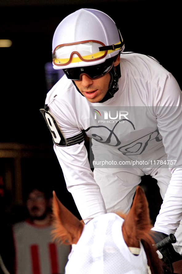 Jockey Jeffrey Alderson rides out of the paddock for the second race at Woodbine Racetrack in Toronto, Canada, on November 16, 2024. 