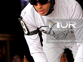 Jockey Jeffrey Alderson rides out of the paddock for the second race at Woodbine Racetrack in Toronto, Canada, on November 16, 2024. (