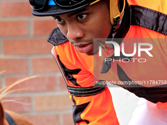 Jockey Desean Bynoe rides out of the paddock for the second race at Woodbine Racetrack in Toronto, Canada, on November 16, 2024. (