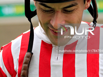 Jockey Sahin Civaci smiles as he leaves the track after riding Exchange Day to a win in the third race at Woodbine Racetrack in Toronto, Can...