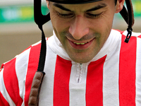 Jockey Sahin Civaci smiles as he leaves the track after riding Exchange Day to a win in the third race at Woodbine Racetrack in Toronto, Can...