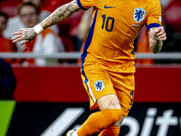 Netherlands forward Noa Lang participates in the match between the Netherlands and Hungary at the Johan Cruijff ArenA for the UEFA Nations L...