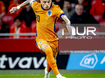 Netherlands forward Noa Lang participates in the match between the Netherlands and Hungary at the Johan Cruijff ArenA for the UEFA Nations L...