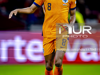 Netherlands midfielder Ryan Gravenberch participates in the match between the Netherlands and Hungary at the Johan Cruijff ArenA for the UEF...