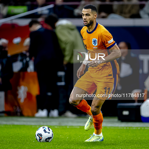 Netherlands forward Cody Gakpo participates in the match between the Netherlands and Hungary at the Johan Cruijff ArenA for the UEFA Nations...