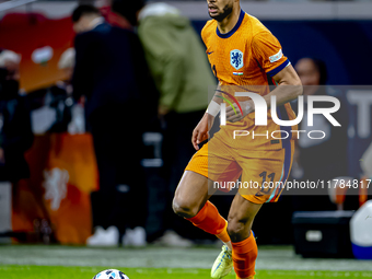 Netherlands forward Cody Gakpo participates in the match between the Netherlands and Hungary at the Johan Cruijff ArenA for the UEFA Nations...