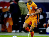 Netherlands forward Cody Gakpo participates in the match between the Netherlands and Hungary at the Johan Cruijff ArenA for the UEFA Nations...