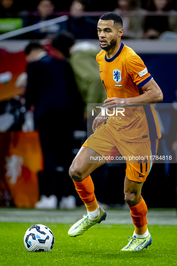 Netherlands forward Cody Gakpo participates in the match between the Netherlands and Hungary at the Johan Cruijff ArenA for the UEFA Nations...