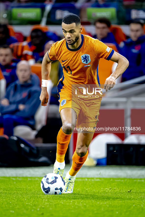 Netherlands forward Cody Gakpo participates in the match between the Netherlands and Hungary at the Johan Cruijff ArenA for the UEFA Nations...