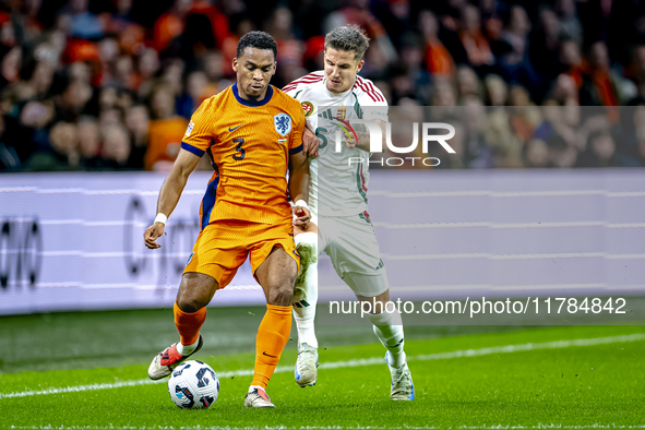 Netherlands defender Jurrien Timber and Hungary midfielder Tamas Nikitscher play during the match between the Netherlands and Hungary at the...