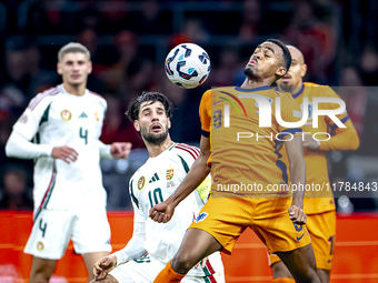 Hungary midfielder Dominik Szoboslai and Netherlands midfielder Ryan Gravenberch play during the match between the Netherlands and Hungary a...