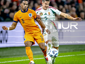 Netherlands defender Jurrien Timber and Hungary midfielder Tamas Nikitscher play during the match between the Netherlands and Hungary at the...