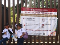 People apply for permanent driver's licenses at a processing point installed in the Ciudad Deportiva, in the Iztacalco mayor's office, in Me...