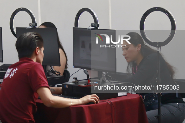 People apply for permanent driver's licenses at a processing point installed in the Ciudad Deportiva, in the Iztacalco mayor's office, in Me...