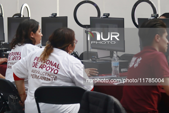 People apply for permanent driver's licenses at a processing point installed in the Ciudad Deportiva, in the Iztacalco mayor's office, in Me...