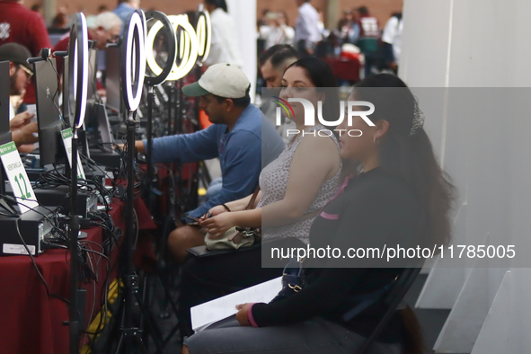 People apply for permanent driver's licenses at a processing point installed in the Ciudad Deportiva, in the Iztacalco mayor's office, in Me...