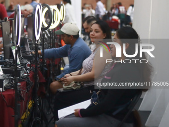 People apply for permanent driver's licenses at a processing point installed in the Ciudad Deportiva, in the Iztacalco mayor's office, in Me...