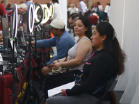 People apply for permanent driver's licenses at a processing point installed in the Ciudad Deportiva, in the Iztacalco mayor's office, in Me...