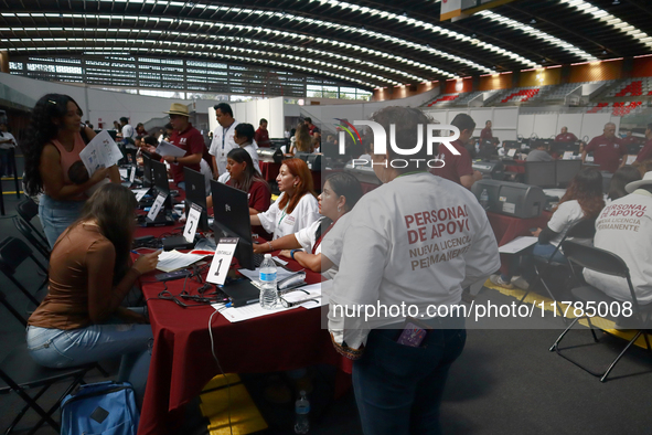 People apply for permanent driver's licenses at a processing point installed in the Ciudad Deportiva, in the Iztacalco mayor's office, in Me...